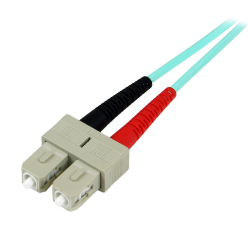 StarTech.com 10m (30ft) LC/UPC to SC/UPC OM3 Multimode Fiber Optic Cable, Full Duplex 50/125µm Zipcord Fiber Cable, 100G, Low Insertion Loss, LSZH Fiber Jumper Cord